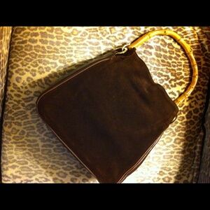 Suede bag with bamboo handle
